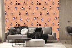 Fototapeta: Ludzie jadący rowerami na pomarańczowym tle