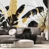 Fototapeta: Luxury gold and black tropical plant background vector. floral