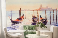 Fototapeta: Malowane gondole na wodzie z zachodem słońca