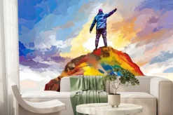 Fototapeta: Man with backpack standing on the top of mountain and enjoying