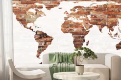 Fototapeta: Mapa świata z cegły na jasnej ścianie