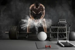 Fototapeta: Mężczyzna przygotowuje się do treningu