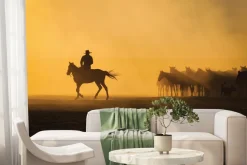 Fototapeta: Mężczyzna z końmi na pustyni