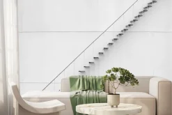 Fototapeta: Metalowe delikatne schody przy białej ścianie