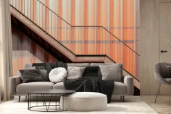 Fototapeta: Metalowe schody na tle budynku