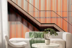 Fototapeta: Metalowe schody na tle budynku