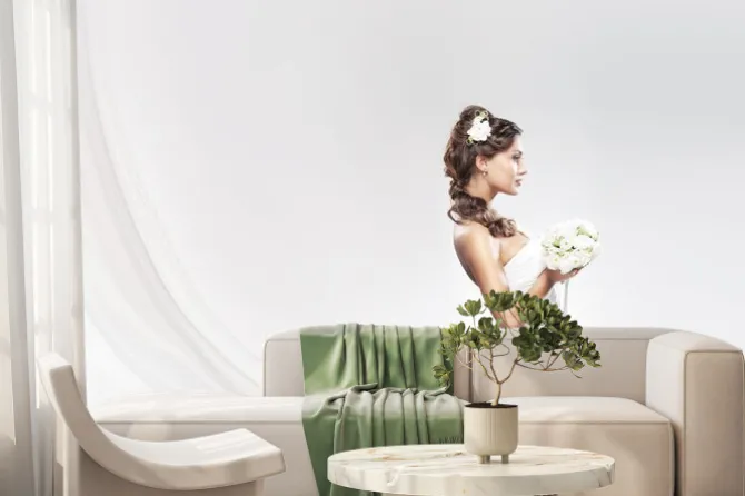 Fototapeta: Młody kaukaski młodej stwarzających w białej sukni z kwiatami