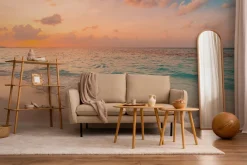 Fototapeta: Morskie fale wypływające na plażę o wschodzie