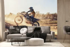 Fototapeta: Motocyklista jadący po wzgórzu