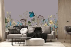 Fototapeta: Niebieski motyl na kwiecistej łące naturalny krajobraz