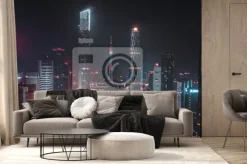Fototapeta: Panorama miasta z oświetlonymi wieżowcami