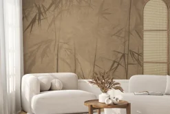 Fototapeta: Pędy bambusu na brązowej ścianie