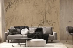 Fototapeta: Pędy bambusu na brązowej ścianie