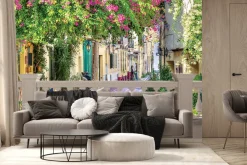 Fototapeta: Pejzaż toskanii z barwną roślinnością i starymi murami