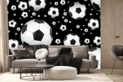 Fototapeta: Piłka nożna na czarnym tle.