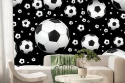 Fototapeta: Piłka nożna na czarnym tle.