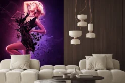 Fototapeta: Piękna dziewczyna w czarnej sukni tancerka w pozie twórczej nad