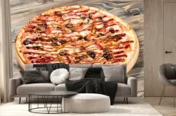 Fototapeta: Pizza na starym drewnianym biurku