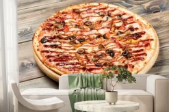 Fototapeta: Pizza na starym drewnianym biurku