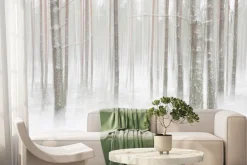 Fototapeta: Pnie drzew w gęstym białym śniegu