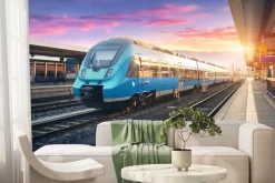 Fototapeta: Pociąg na dworcu w promieniach zachodzącego słońca