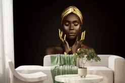 Fototapeta: Portrait closeup beauty fantasy african woman face in gold paint.