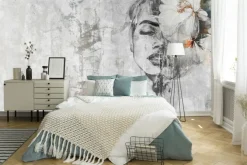 Fototapeta: Portret kobiety z kwiatem na betonie