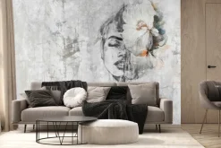 Fototapeta: Portret kobiety z kwiatem na betonie