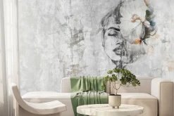 Fototapeta: Portret kobiety z kwiatem na betonie