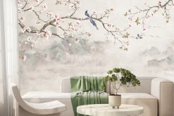 Fototapeta: Ptak na gałęzi wiśni na tle gór i jeziora