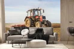 Fototapeta: Rolnik uprawiający ziemię orną przed wysiewu