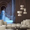 Fototapeta: Sad snow queen walks in old castle. blue silk long raincoat train