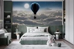 Fototapeta: Słoń w balonie unoszący się nad chmurami