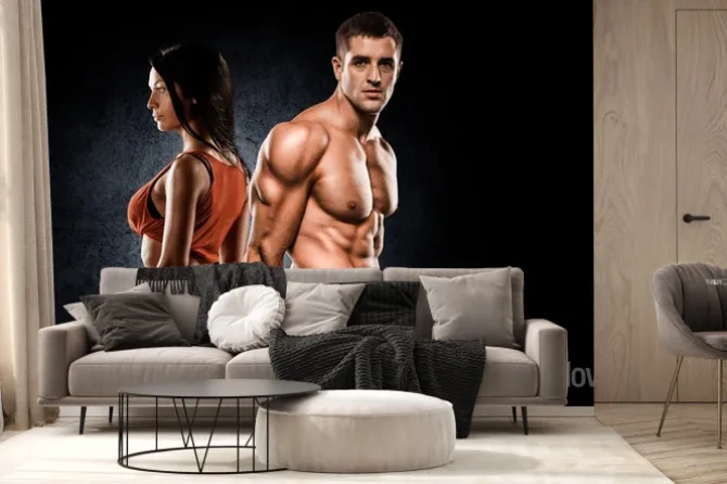 Fototapeta: Sportowiec para pozuje do kamery