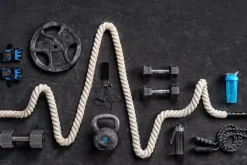 Fototapeta: Sprzęt sportowy do ćwiczeń na siłowni