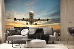 Fototapeta: Startujący samolot w świetle słońca
