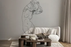 Fototapeta: Subtelna kobieta na tle liści