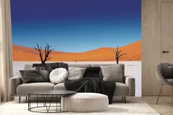 Fototapeta: Suche drzewa na pustyni ze wzgórzami