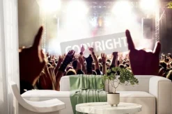 Fototapeta: Sylwetki tłumu koncertowego przed jasnym scenicznych świateł