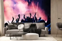 Fototapeta: Sylwetki tłumu koncertowego przed jasnym scenicznych świateł
