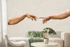 Fototapeta: Symboliczny dotyk dłoni artystyczna kompozycja na tle betonu