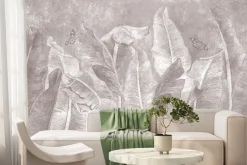 Fototapeta: Tropikalne liście bananowca i motyle na teksturowym tle w monochromatycznych