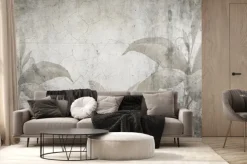 Fototapeta: Tropikalne liście na popękanej starej ścianie