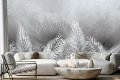 Fototapeta: Tropikalne liście palmy w bieli i szarości z efektem betonu