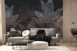 Fototapeta: Tropikalne rośliny na ciemnej betonowej ścianie