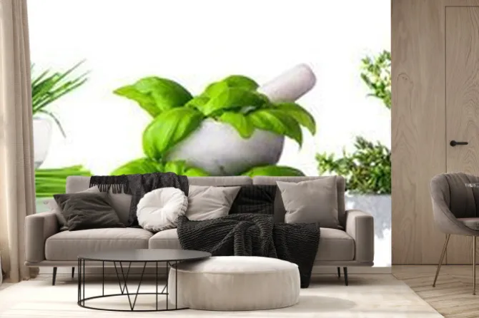 Fototapeta: Tłuczek i moździerz z zielonymi ziołami