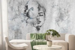 Fototapeta: Twarz kobiety z kwiatem na betonowym tle