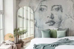 Fototapeta: Twarz kobiety i duże liście na betonowym tle