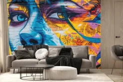 Fototapeta: Twarz kobiety na kolorowym ceglanym murze