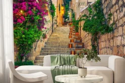 Fototapeta: Uliczka w chorwacji z kamienną architekturą